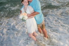 Orange-Beach-Bride-and-Groom-in-Water_resize